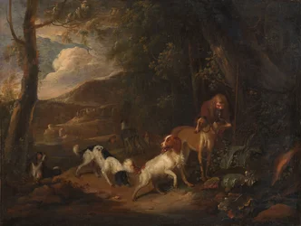 Jägare med hundar vid kanten av en skog