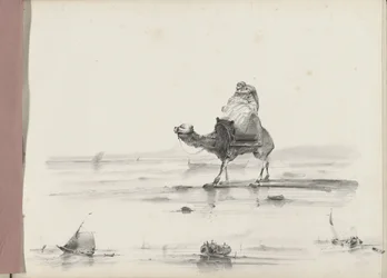 Man rider på en kamel längs en kust