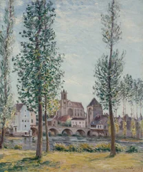 Vy över Moret sur Loing genom träden