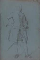 Man står och håller en stav i sin vänstra hand, full längd