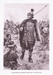 En legionär som vaktar fångar på ett fält, illustration från The Roman Soldier, 1928