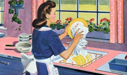 1940-talets hemmafru diskar i sitt drömkök