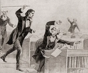 Preston Smith Brooks, en ivrig förespråkare för slaveri, anföll senator Charles Sumner, en abolitionist, med en käpp på golvet i den amerikanska senaten, den 22 maj