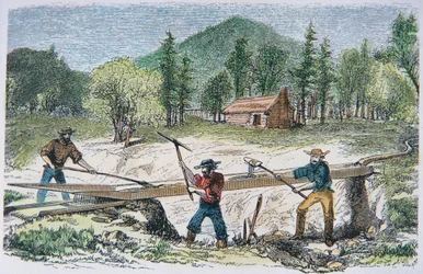 Prospektörer som använder en sluss under guldrushen i Kalifornien 1849 (färg litho)