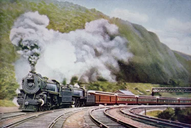 New York till Chicago Express vid Horse-Shoe Curve, Alleghany, ca 1930 (lito i färg)