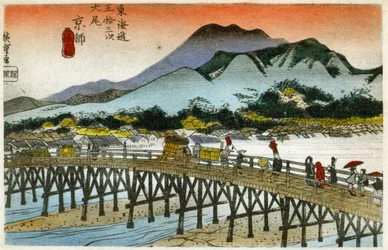 Geografi. Morgonrodnad vid Nihonbashi (55:e stationen). Träsnitt av Hiroshige i: Femtiotre stationer på Tokaido (1833-1834). Vykort, Japan, ca 1900 (vykort)