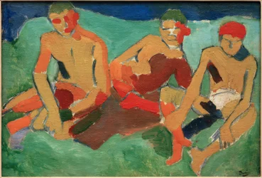 Tre figurer sitter på gräset