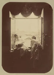 [Två unga kvinnor vid fönstret], ca. 1870.