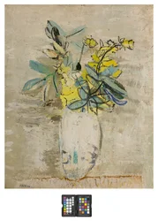 Grenar med blommor i en vas
