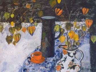 Kinesiska lyktor i en svart kanna