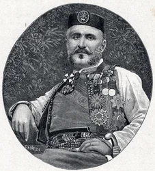 Porträtt av Nikola I av Montenegro (Nikola I Petrović-Njegoš) (Petrović-Njegoš) (1841-1921), furste av Montenegro och Brda. Gravyr i "Les Missions Catholiques au XIXe Siecle" av Louis-Eugène (Louis Eugène) Louvet. Privat samling.