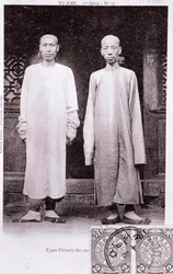 Porträtt av två kineser från Yunnan-regionen i traditionella dräkter Fotografi från början av 1900-talet - Privat samling
