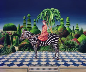 Dam på en zebra