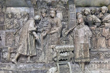 Columbus och de katolska kungarna, detalj av presentationen av Columbus för de katolska kungarna på Salon del Tinell i Barcelona (brons)
