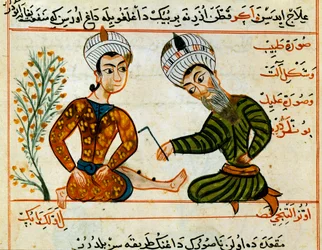 Kauterisering av ett sår. Miniatyr från en mjölkning av arabisk medicin. 1400-talet Paris, B.N.
