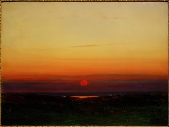 Solnedgång över stäppen vid en sjöstrand
