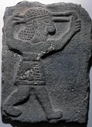 Figur som skjuter en sele, berätta för Halaf