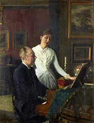 Skådespelaren Peter Jerndorff och hans fru Amalie vid pianot