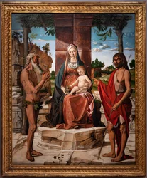 Madonna med spädbarnet Jesus under en pergola bland de heliga Johannes Döparen och Onuphriusm 1485-86 (olja på panel)