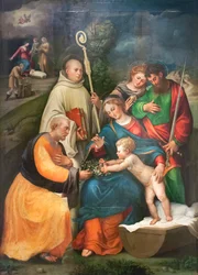 Den heliga familjen med heliga Benedictus, Paulus och Magdalena
