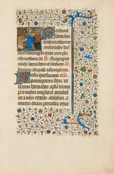 Sankt Barnabas läser ur en bok