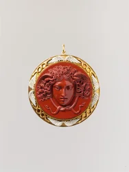 Head of Medusa (röd jaspis monterad i guld med vit emalj)