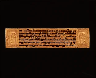 Sida från ett burmesiskt buddhistiskt manuskript (penna & bläck och träsnitt på papper)