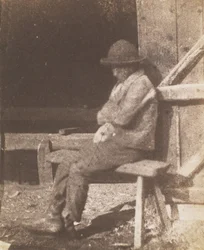 Sittande pojke, 1845-50.