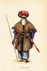 Noble Tuareg-krigare från Agadez, Niger, i tagelmust (turban och slöja), taktkat (skjorta) och akarbey (byxor)