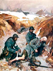 Röda korssjuksköterskor klär på en skadad soldat
