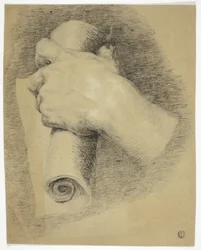 Hand håller pappersrulle