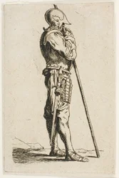 En soldat som står i profil