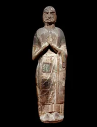 Kinesisk konst: staty som föreställer en kasyapa, Buddhas munklärjunge. Sui-dynastin (581-618 e.Kr.). Paris, Guimet Museum, Asian Arts Museum.