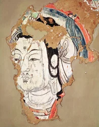 Buddhas huvud med en gloria, från Kao-chang, Xinjiang, kinesiska Turkestan, 800-900-talet