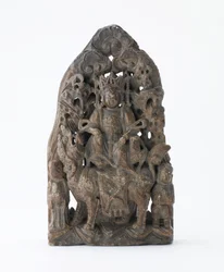 Liten täljstenstavla, med genomborrad relief av Manjusri på lejon, period av division, 543 e.Kr.