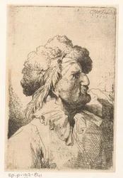 Man med pälsmössa och fjäder