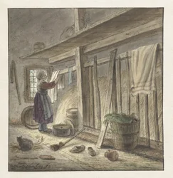 Hörn av ett stall med en flicka som hänger en trasa
