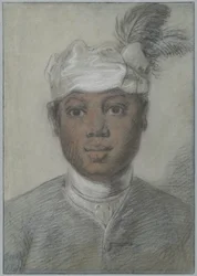 Huvud av en ung svart man med fjäderprydd turban