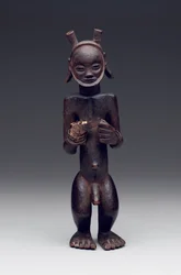 Rituell behållare i form av en stående mansfigur