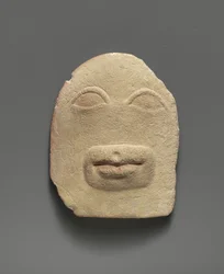 Limestone votive relief av ögon och en mun (kalksten)