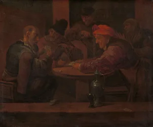 Män spelar kort i en krog