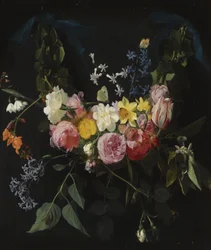 Blomstergirlang upphängd i två blå band