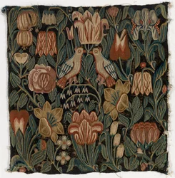 Gobeläng kuddfodral föreställande två fåglar bland blommor, tillverkat i Schleswig-Holstein, Danmark, ca 1690 (ull)