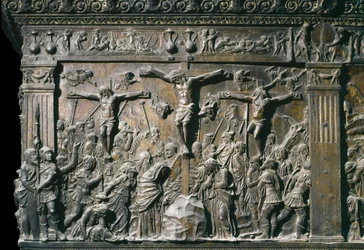 Föreställning av den goda tjuven (Dismas) och den onda tjuven (Gesmas), korsfästa tillsammans med Jesus Kristus. Låg relief på vänster predikstol, omkring 1460.