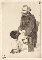 Manet sittande, vänd åt vänster