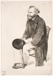 Manet sittande, vänd åt vänster