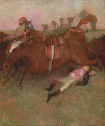 Scen från hinderloppet: den fallne jockeyn