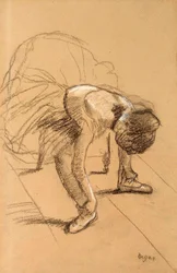 Sittande dansare justerar sina skor, c1876.