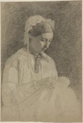 Broderande kvinna
