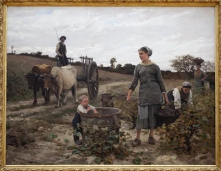 Hörn av vinstockar; Languedoc. Lantlig scen med en man på en vagn, kvinnor som plockar druvor och ett barn som äter de skördade frukterna. Målning av Edouard Debat Ponsan (1847-1913), olja på duk